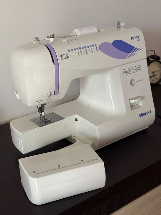 Masina de cusut electromecanica Minerva NEXT141D, 10 programe, 850 imp/min, 70W, Alb/Mov