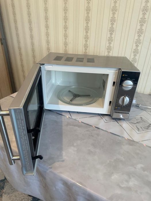 Микроволновую печку продам
