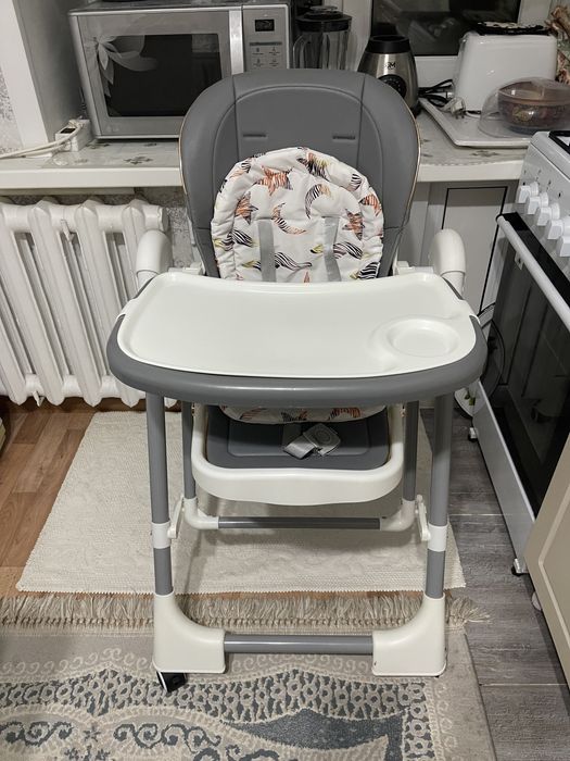 Стол для кормления-качеля.