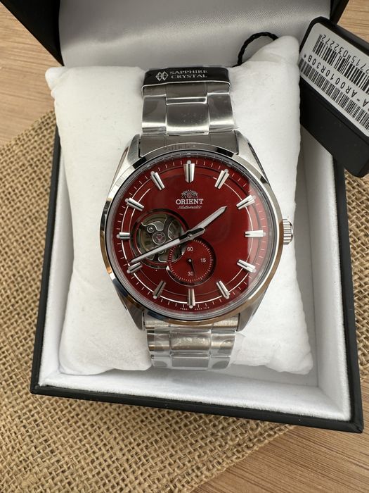 Ceas Orient Contemporary Red Dial Open Heart RA-AR0010R10B