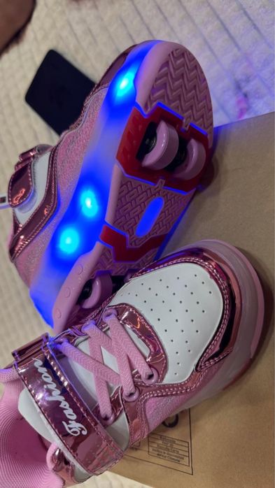 Кроссовки-ролики новые