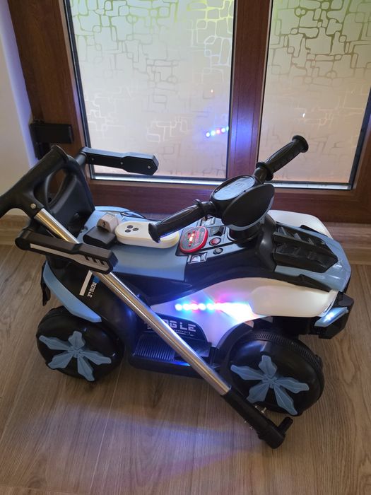 ATV electric pentru copii cu lumini LED și muzică – stare excelentă