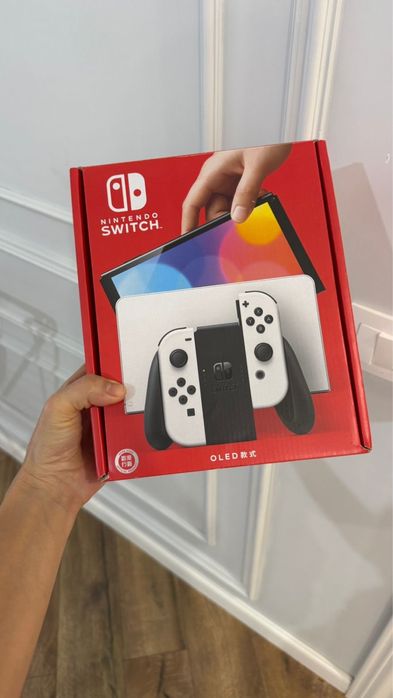 Продаю игровую консоль Nintendo Switch OLED (белый)