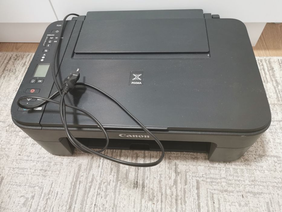 Donez imprimantă Canon Pixma 3100