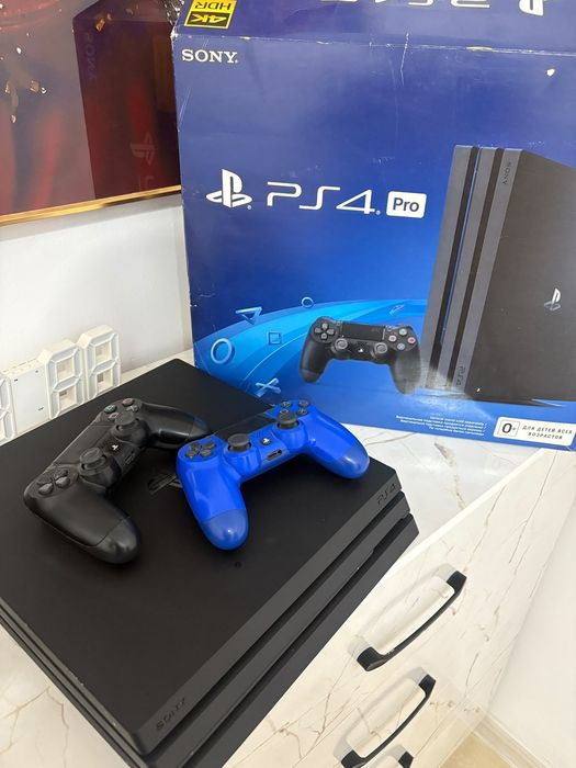 Ps 4 pro + 2 controller + физ. Игры + купленные игры