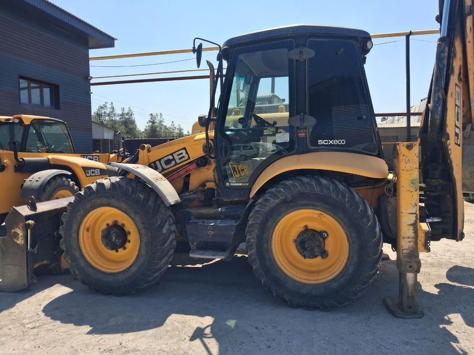 JCB 5cx Sotiladi holati yaxshi yili 2014