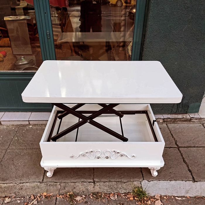 Разстгателна маса на , различни нива