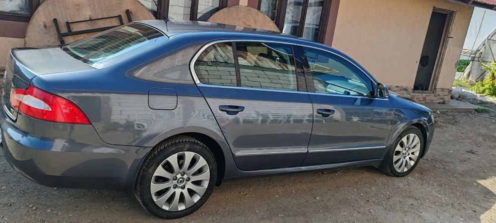 Skoda superb 2. 0 140 cp