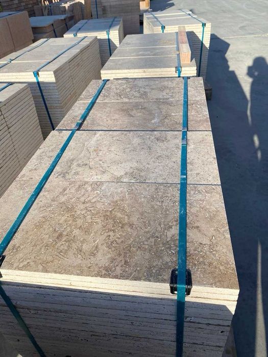 Облицовка дома натуральным камнем