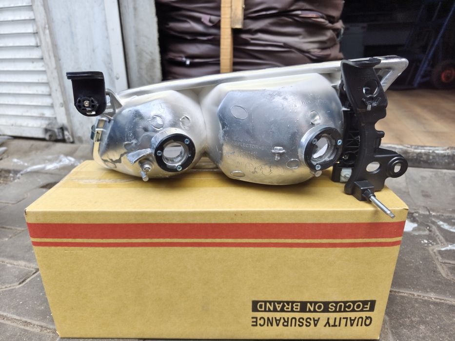 Камри 25 фара американец