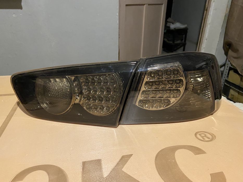 Задний фонарь лансер 10