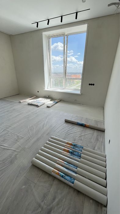 Поклейка обоев. Выравнивание стен.