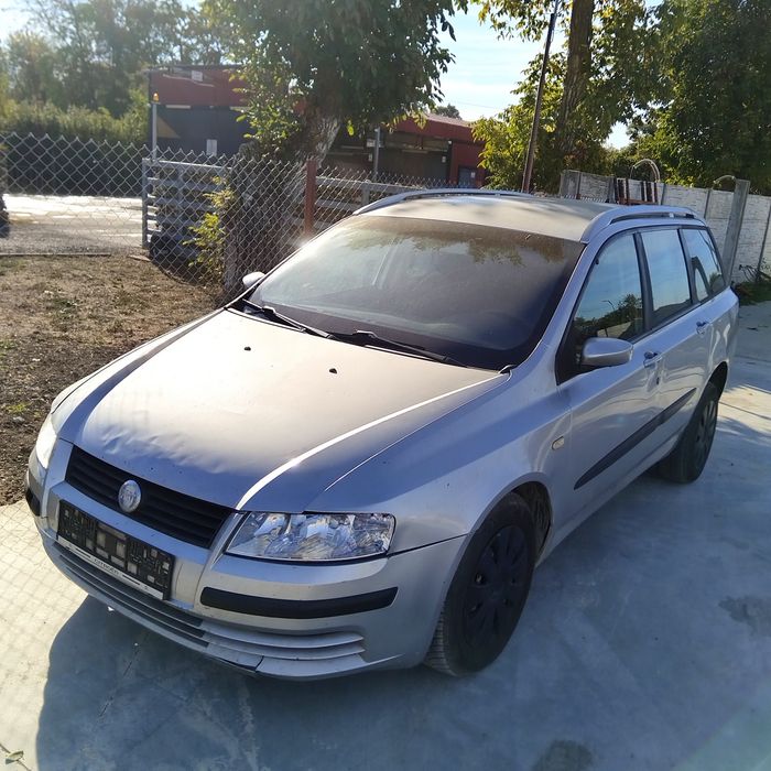 Far/faruri stanga/dreapta Fiat Stilo an 2003-2008
