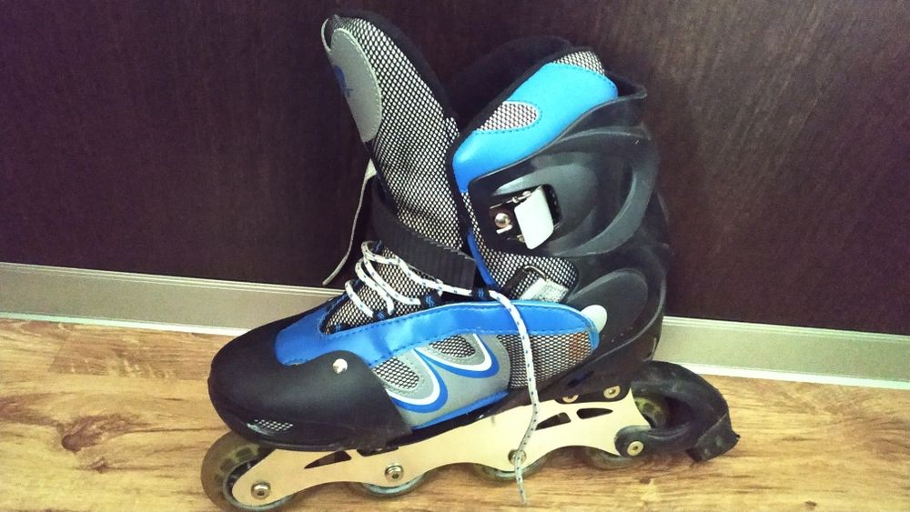 Роликовые коньки