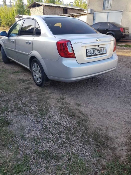 Ласетти 1.8 холати яхши