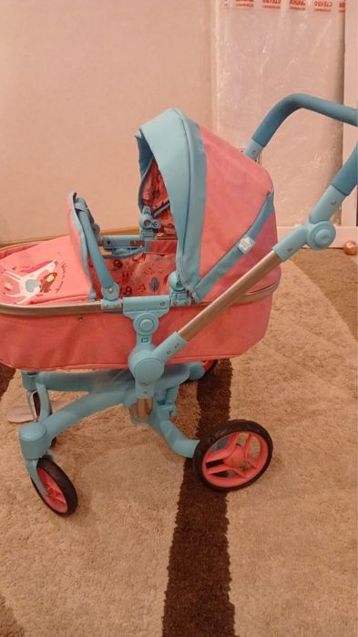 Игрушечная детская коляска