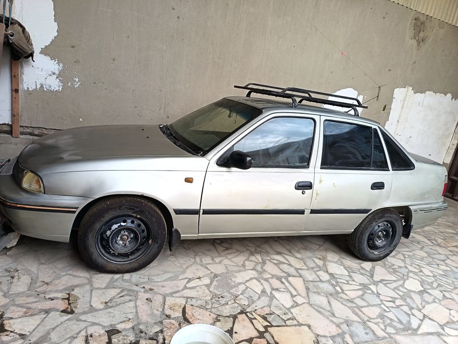 Nexia Dohc (kulrang rangli),holati yaxshi