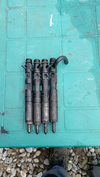 Injectoare Dacia Logan 1.5 Dci E3 Și E 4