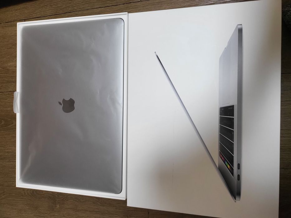 Macbook pro karobka hujati bilan