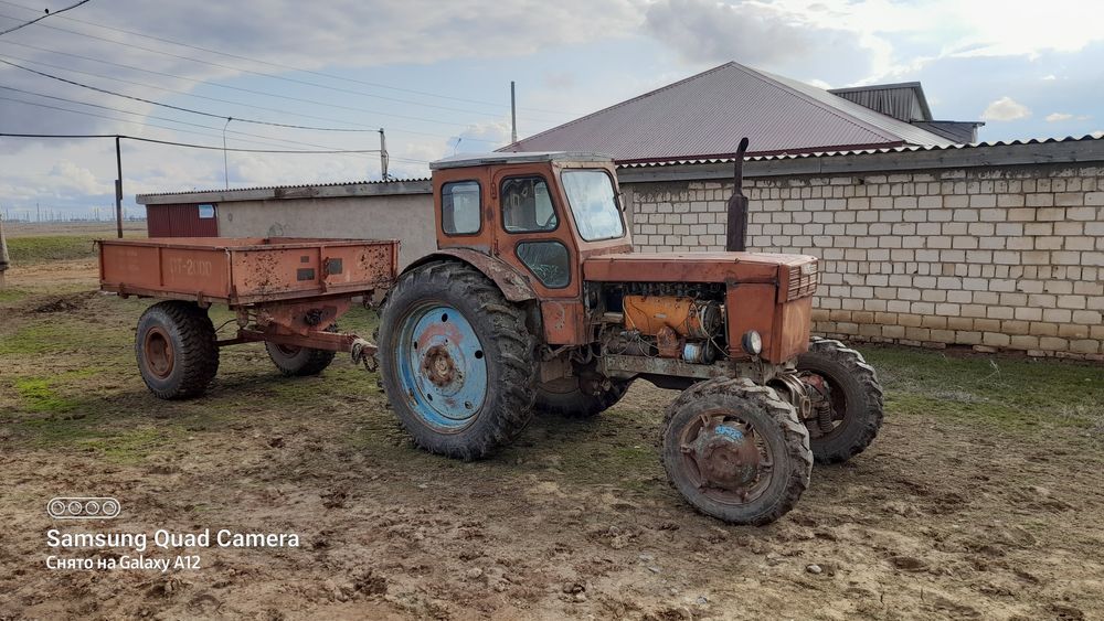 Продам трактор с прицепом