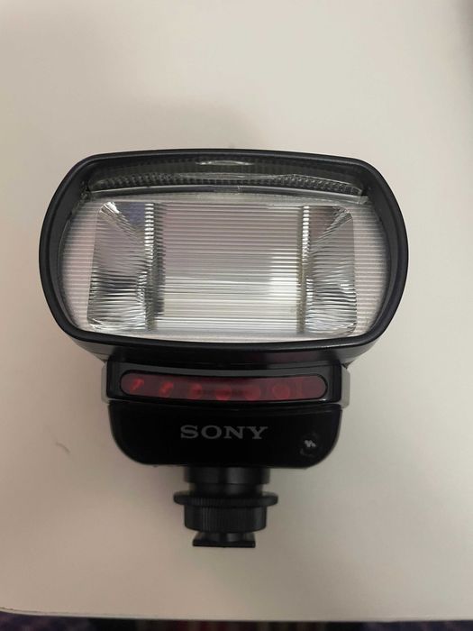 Фотоапарат Pentax EI-2000 и светкавица Sony HVL-F32X