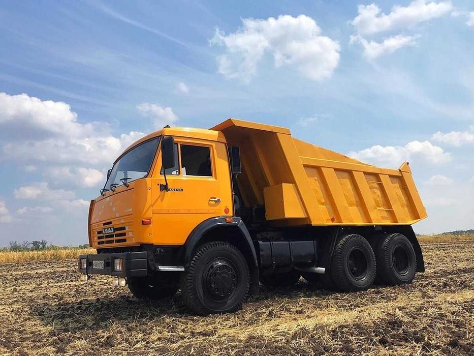 Услуга погрузчика трактор