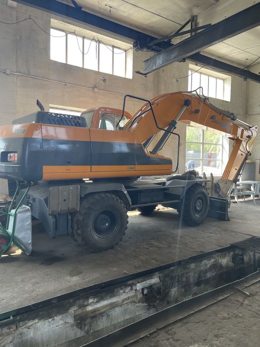 Экскаватор Jonyang 210E