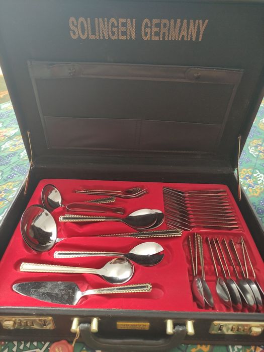 Столовые приборы в чемодане качество