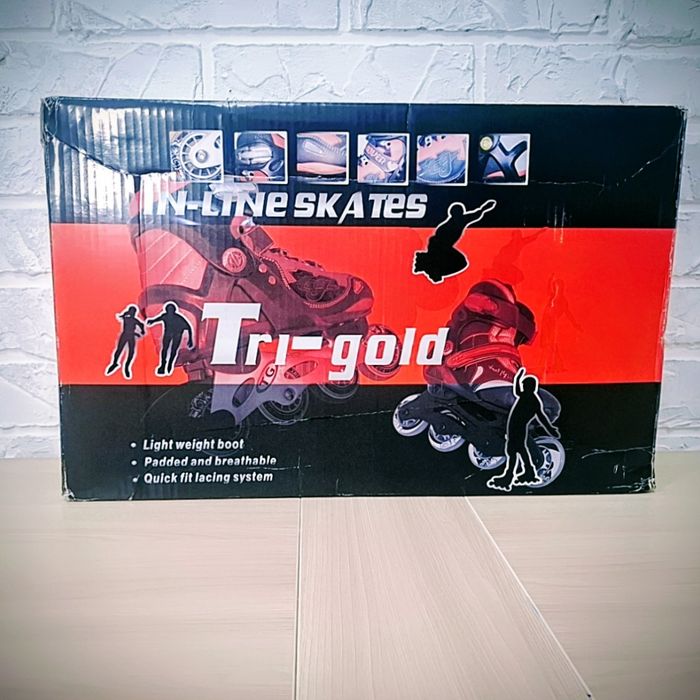 Роликовые коньки