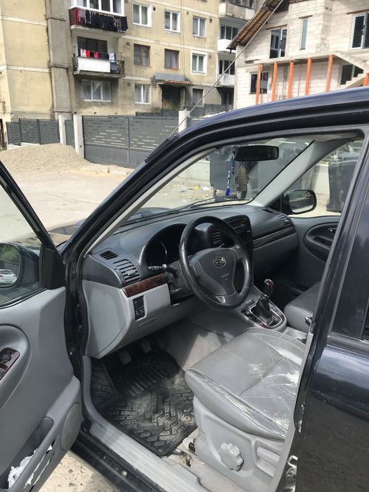 Suzuki Grand Vitara XL7, 7 locuri.