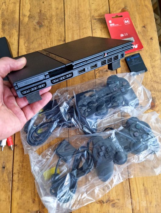 PlayStation 2 slim + 20 games