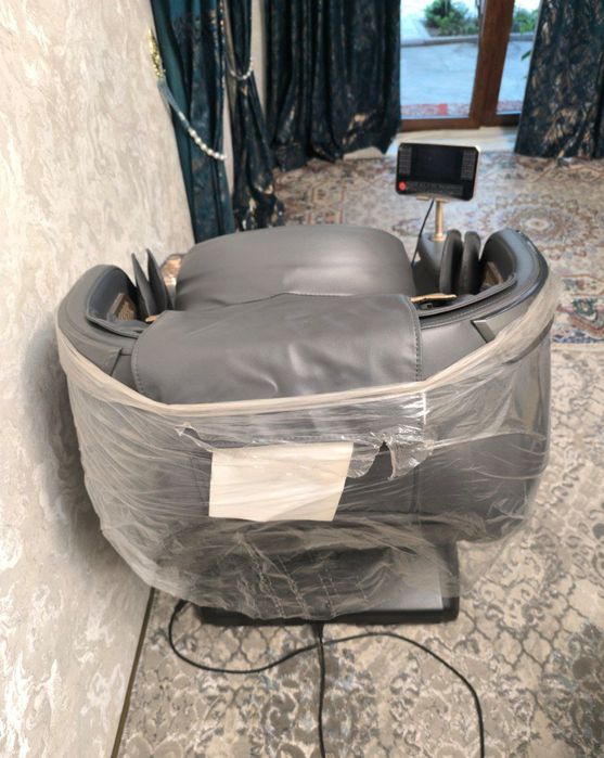 Массажный кресло