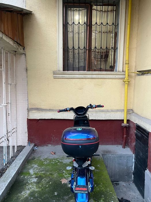 Skuter yangi holatda