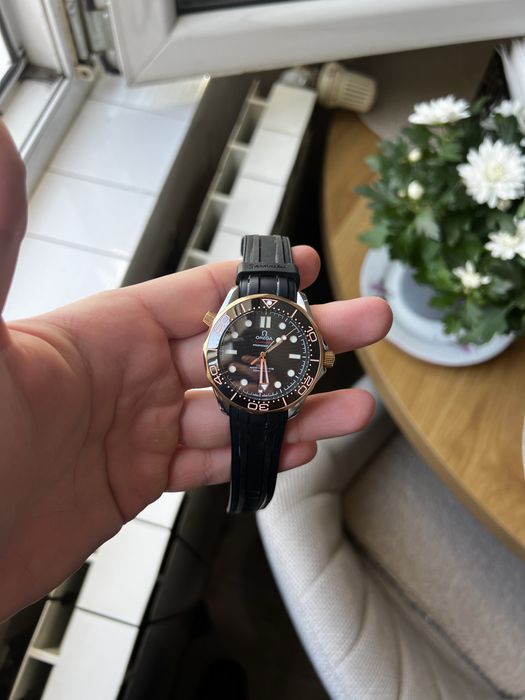 Omega Seamaster Diver 300M Yellow Gold Rubber Strap