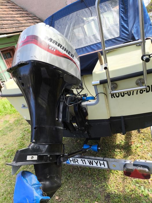 Barca cu motor Mariner Mercury 60 cp Efi si peridoc 750 kg