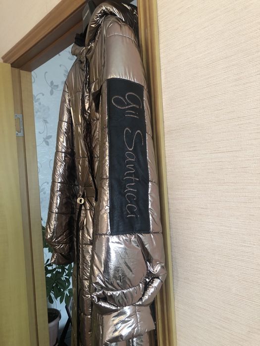 Пуховик производство Италия