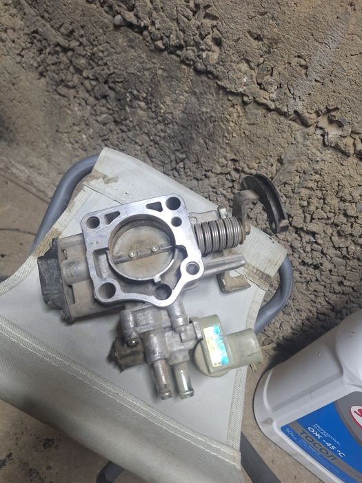 заслонка на карина е 15000