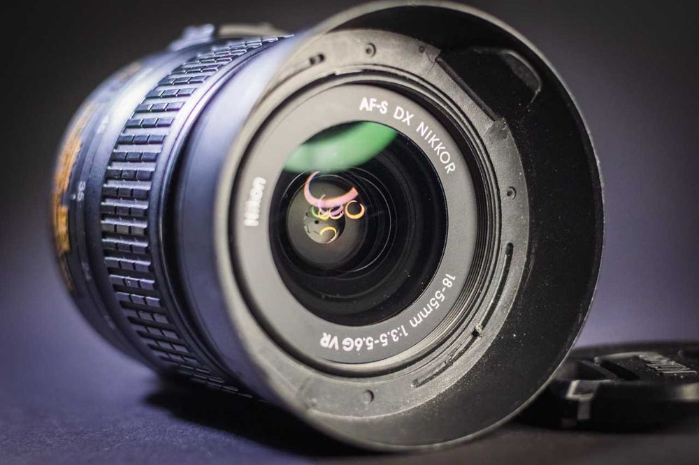 Nikon D5100+obiectiv 18-55mm VR+obiectiv18-140mm VR+accesorii complete