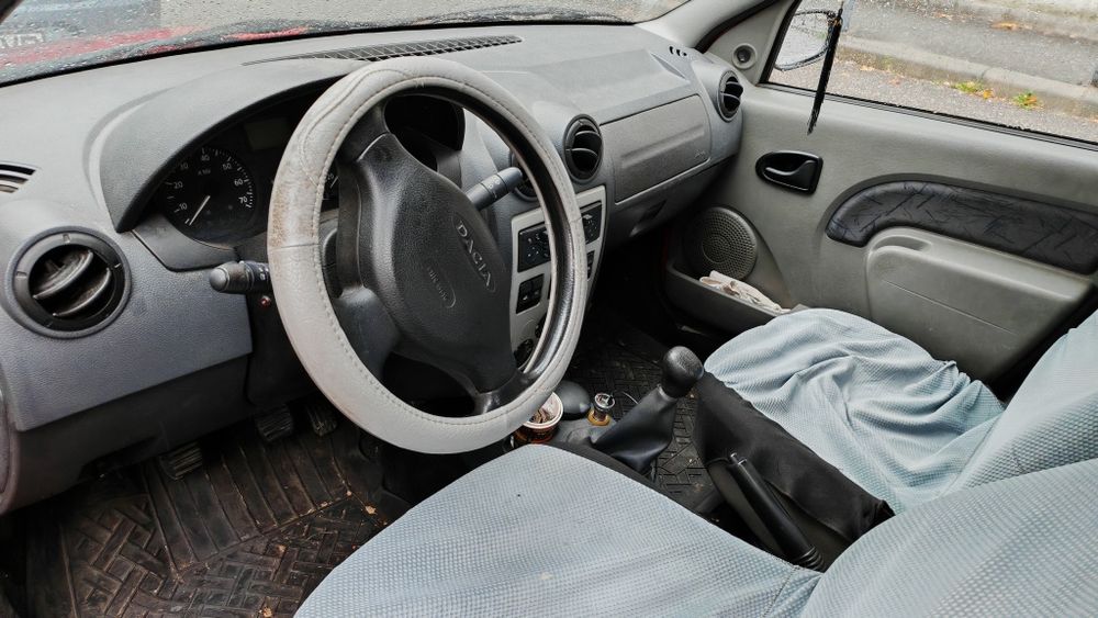 Dacia Logan 1.4 MPI, 2006, roșie, 101.358 km