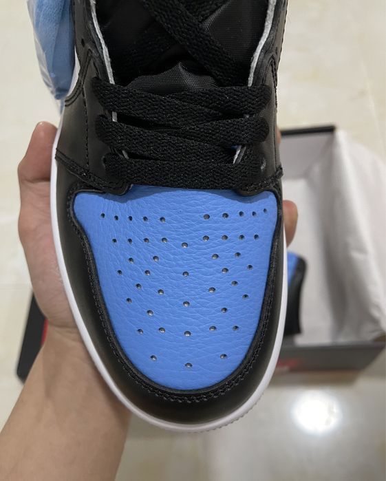 Air Jordan 1 Retro High “UNC Toe”
