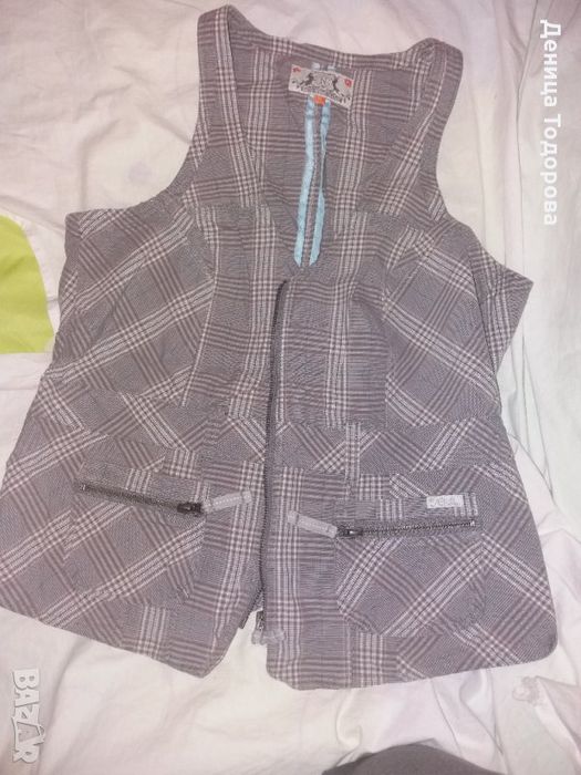 кариран къс елек