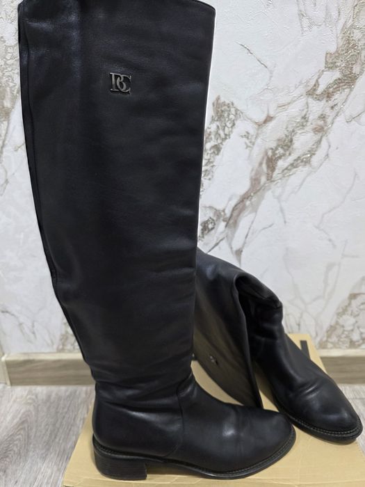 Продам кожаные сапоги