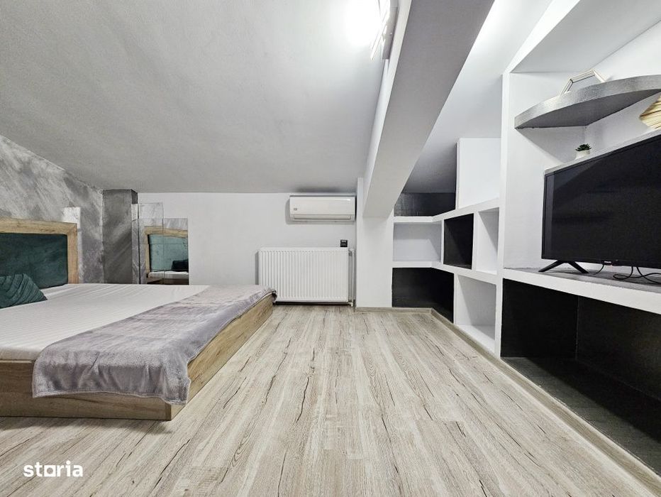 Apartament 2 camere + pod amenajat, in folosinta exclusiva.