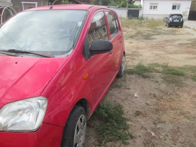 Daihatsu Cuore 2005,benzină