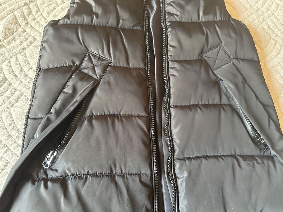 Женская жилетка.