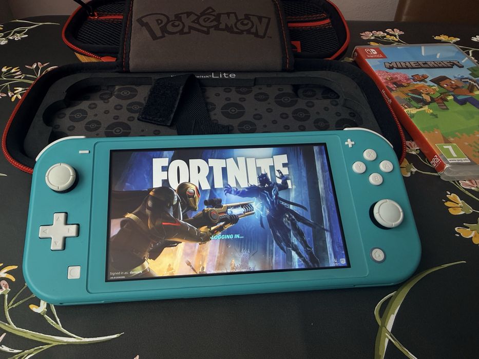Set Nintendo Switch Lite Turquoise + Extra’uri incluse!