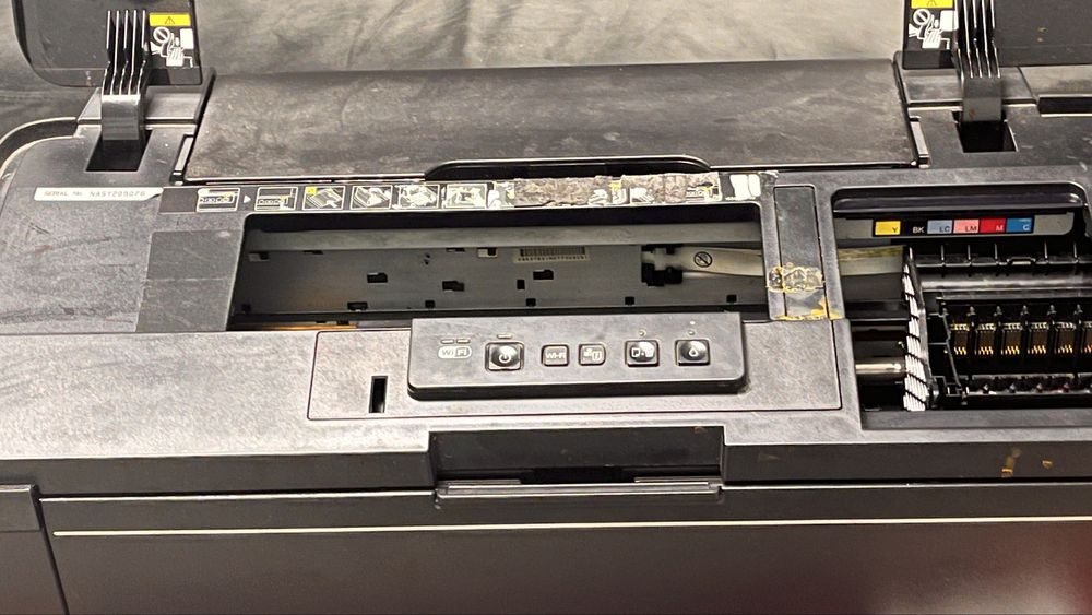 Imprimanta Epson 1500w functionala necesita curatare cap printare