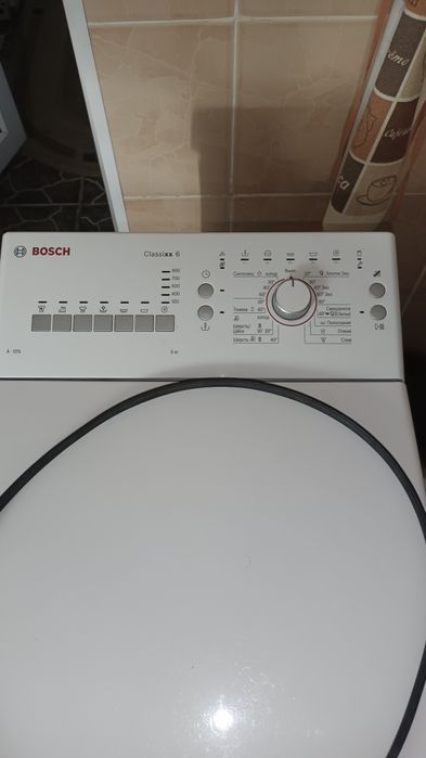 Стиральная машина Bosch classixx6 с вертикальной загрузкой