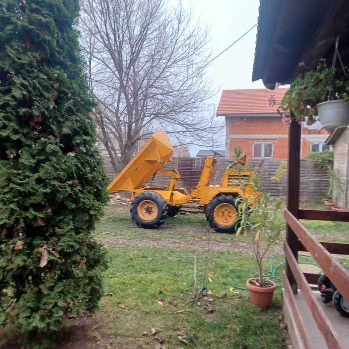 Dumper basculabil trilateral