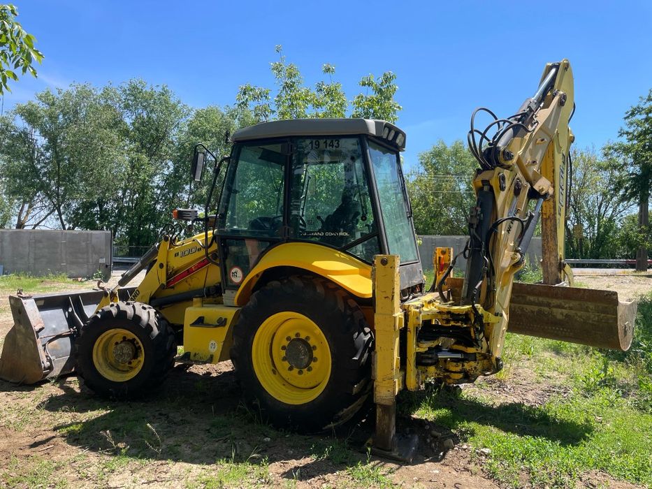 Buldoexcavator New Holland 2012 factura TVA
